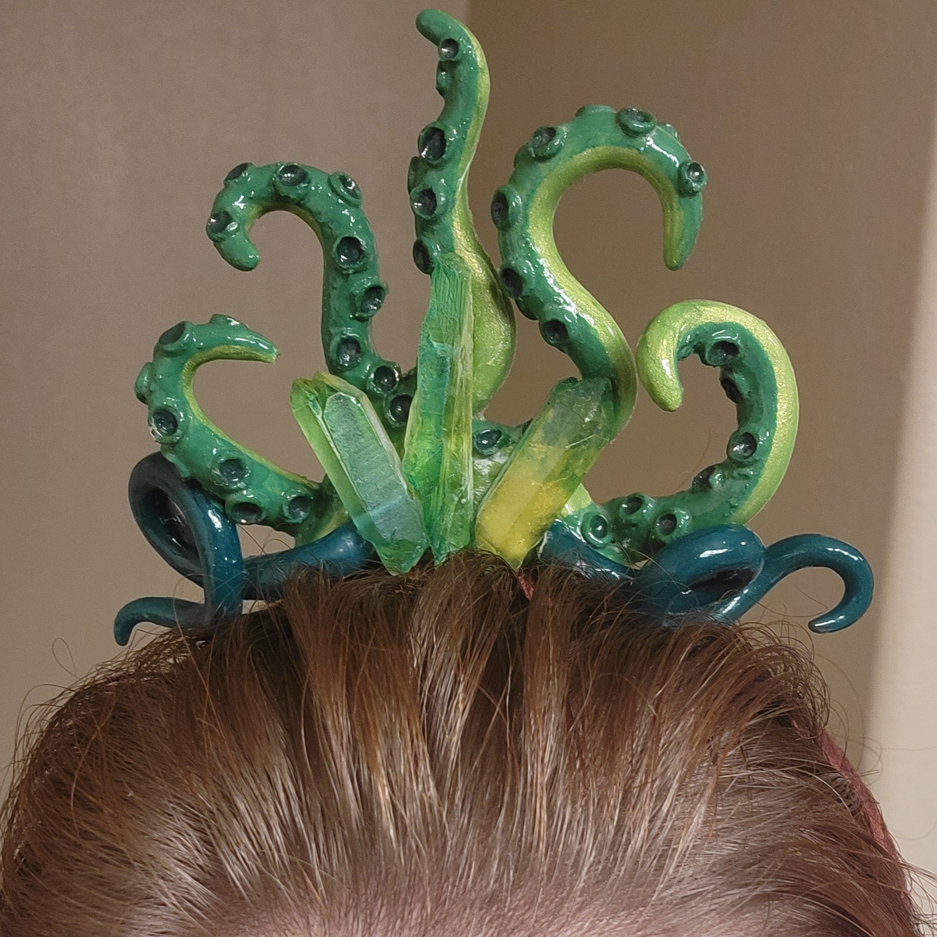 Green tentacle headpiece with crystal details
